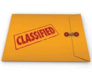 Classified information, plans, secrets or data in a yellow envelope sealed shut and stamped with the word to illustrate it is private or confidential and only for people with clearance to read