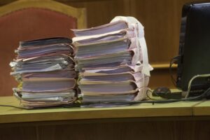 files and folders in the courtroom, justice cases on paper